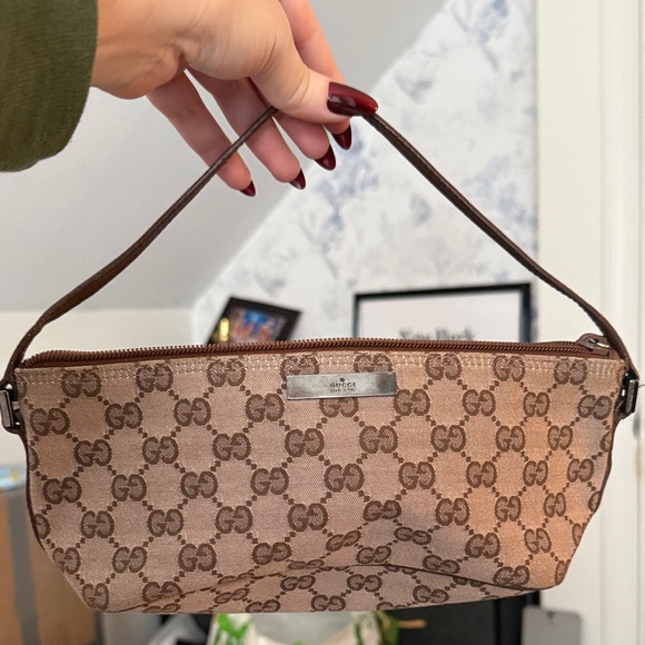 Gucci Handbags - Gucci Tan Monogram Clutch